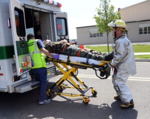 Maj. Michael S. Rutigliano, is placed into a Westhampton Beach Ambulance during a mock auto accident demonstration held on F.S. Gabreski Airport on May 20, 2009. The event was part of the 101 Critical Days of Summer.

(U.S. Air Force Photo/Staff Sgt. David J. Murphy)